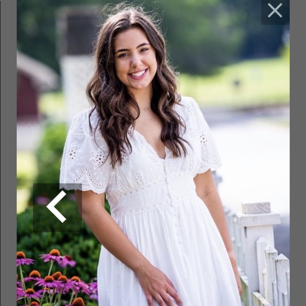 Beautiful white eyelet dress. Mid length, cotton